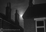 Rooftops in moonlight